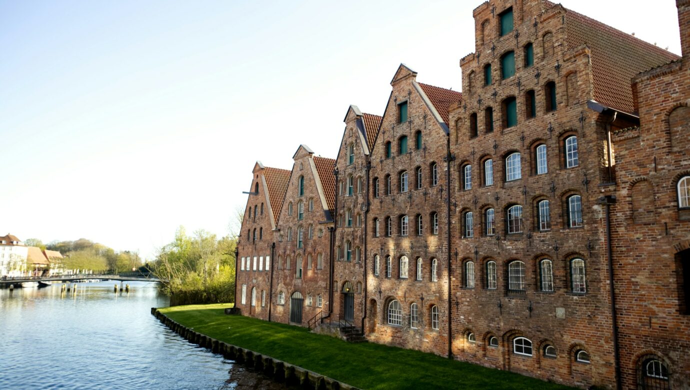 Ancient brick buildings on the banks of the river in the German city of Lubeck