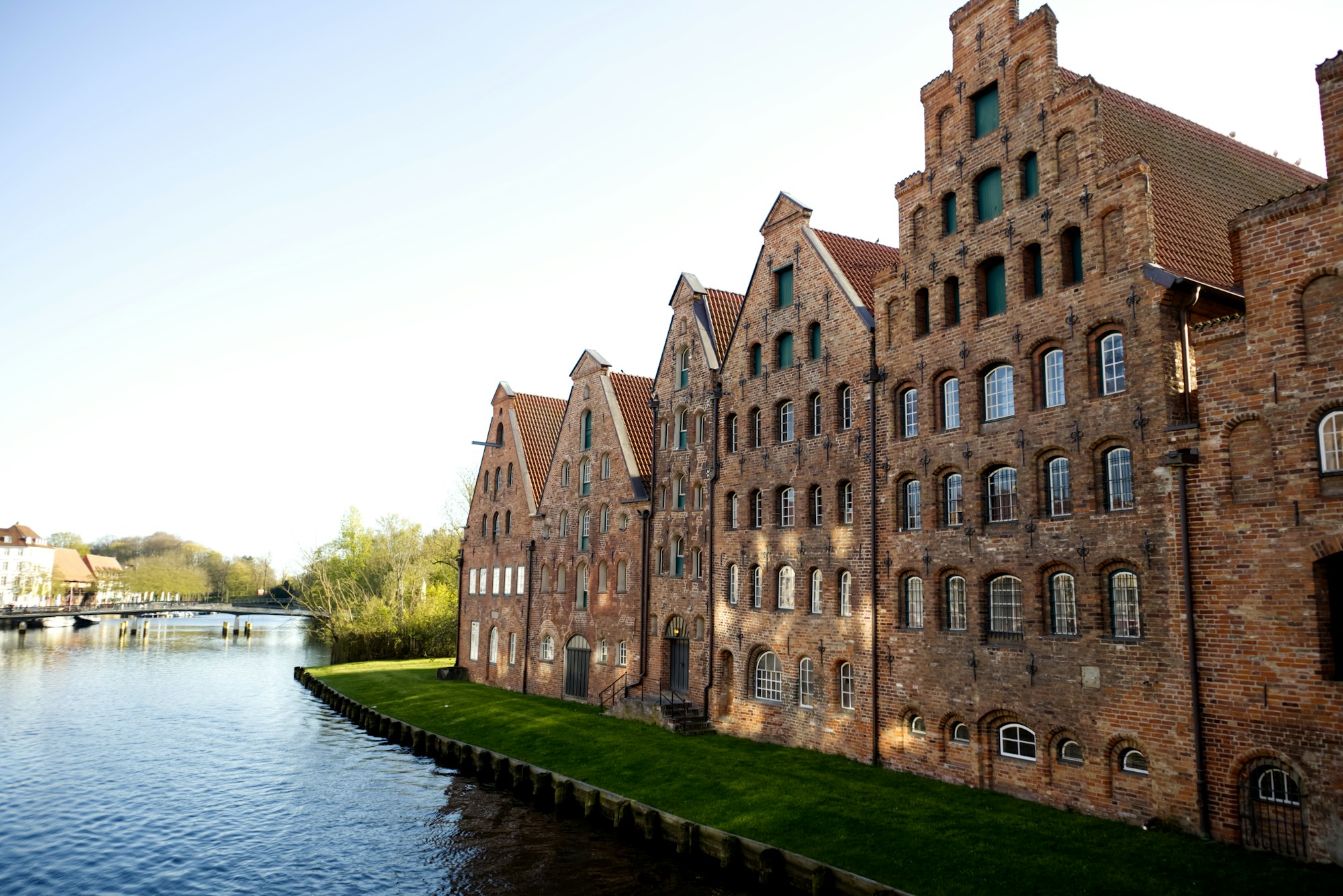 Ancient brick buildings on the banks of the river in the German city of Lubeck